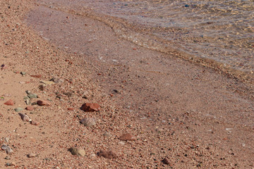 natural simple background of sand stone shoreline 