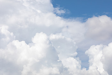 Fluffy cloud edge and blue sky