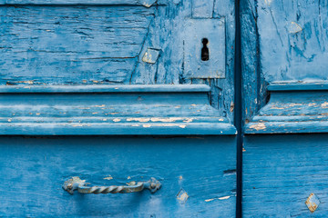 detail of an old blue door