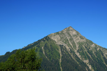 Mountain Niesen in Bernese Oberland in the morning with a clear blue sky. Summer 2019.