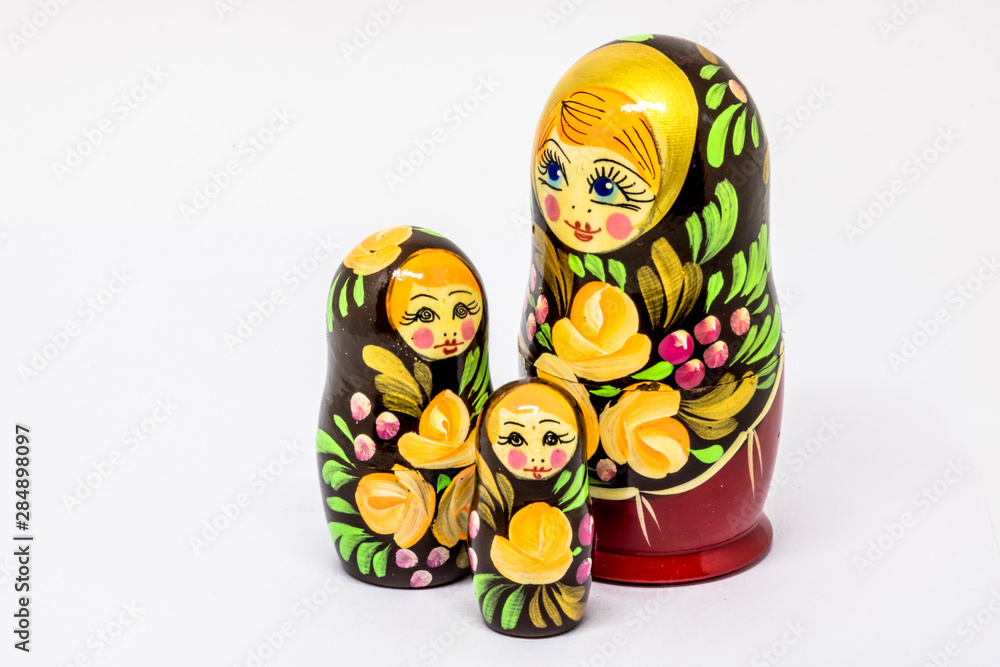 Wall mural Matryoshka family. Russian doll on a White background. Matrioska art.