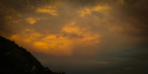Fototapeta na wymiar Sunset over hill