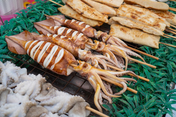 local BBQ grilled squid, Thai street food