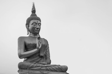 Buddha statue on balck and white style background