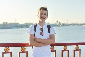 Portrait of stylish smiling teenage boy of 15 years old