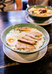 Ramen Cream Pork Bone Soup (Tonkotsu Ramen) with Chashu Pork, Scallion, Sprout, Onion, Menma and Dried Seaweed and boiled egg.