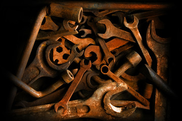 Old rusty tools in vintage style. Close-up photo.