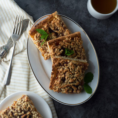 Crumble fruit pie, slice. Homemade cake with fruit jam. Delicious desert.