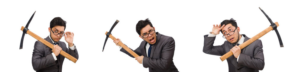 Young businessman holding a tool isolated on white