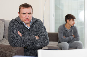 Outraged father unhappy with his son teenager