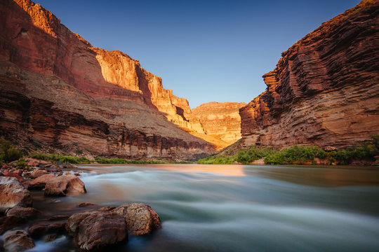 Sunset looking upstream toward Stephen Aisle, Colorado River, Grand Canyon National Park, Arizona, USA