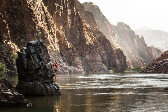 Woman climbing on Vishnu Schist rock