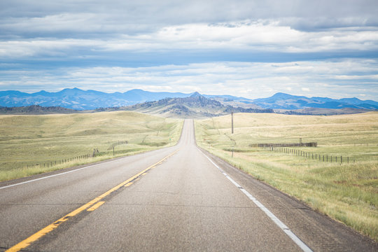 Driving south on scenic route Highway 287 south of Augusta, Central Montana, USA.