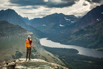 Woman standing on summit near Two Medicine lake