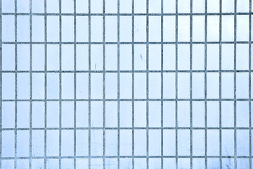 Background from dirty blue rectangular ceramic tiles