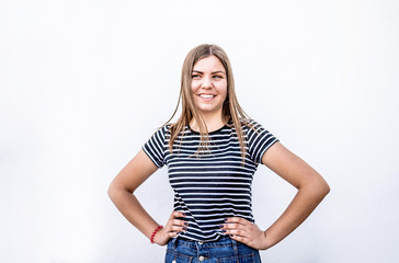 Obraz premium Beautiful smiling caucasian woman with clean skin, natural make-up in casual clothes on grey background