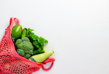 String bag with green vegetables. Zero waste concept.