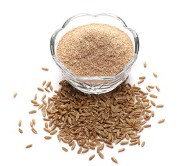 Spelt bran in glass bowl and grain isolated on white background