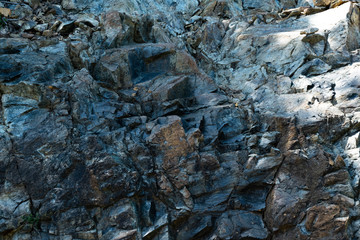 Stone background. Rocky rough textured  backdrop
