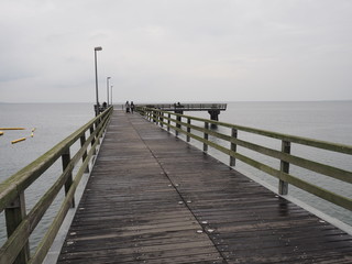 Fototapeta na wymiar Timmendorfer Strand – Strand, Strandkörbe und Seebrücke