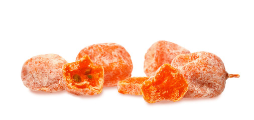 dried kumquat in powdered sugar isolated on white background