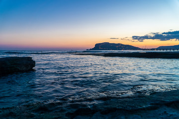 silhouette of alanya city at sunset