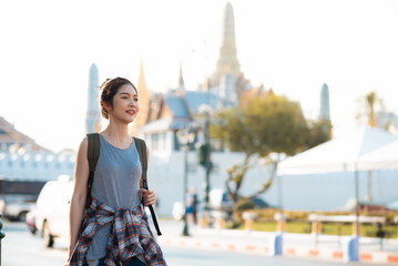 Traveler Asian woman traveling and walking in Bangkok, Thailand, backpacker female feeling happy...