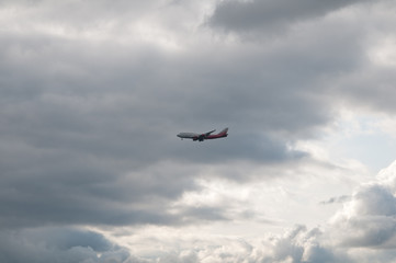 plane in gloomy sky