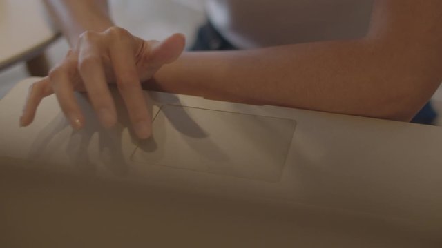 Freelance Asian women working on laptop at office. Young Asia business Girl using the computer for trade, send email, digital work on the internet on table at workplace concept. Slow motion.