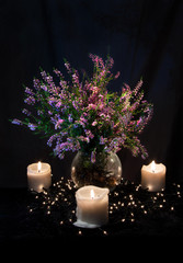 Mystical night composition with Heather and candles