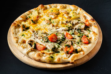 pizza on the black background