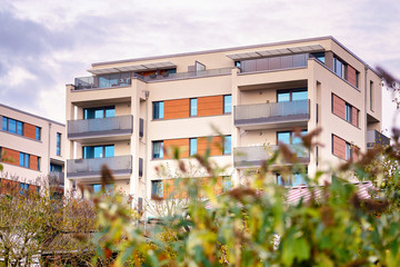 Modern residential building with outdoor facilities in Schwerin. Facade of new low-energy houses.