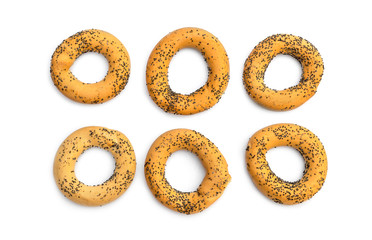 Drying round bagels on white. Top view.
