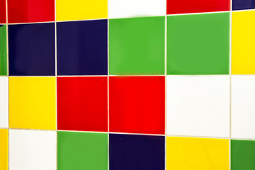 Squares of various bright colors. Concrete details of bright colors are yellow,green, red, yellow, blue and white. rainbow design