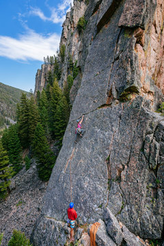 Climbing on 'The Waltz', a 5.8 grade rock climb in Gallatin Canyon, near Bozeman, Montana, USA