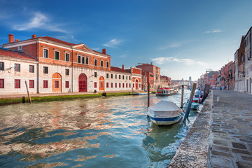 View on romantic narrow canal in Venice city, Italy