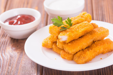 Fried fish sticks ( fingers ) or chicken nugget