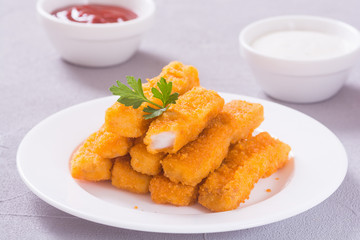Fried fish sticks ( fingers ) or chicken nugget