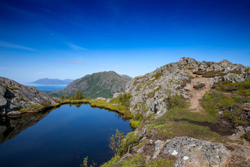 Naklejka na ściany i meble Hiking in the Ramntind mountains in Northern Norway