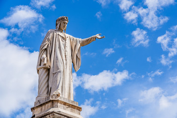 Monument to Dante Alighieri a 19th-century statue of the poet Dante sculpted by Tito Angelini located in Plazza Dante Naples, Italy