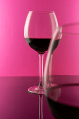 Glasses rose Wine against pink Background with copy space. Valentine's Day concept 