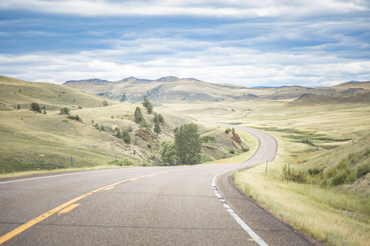 Driving south on scenic route Highway 287 south of Augusta, Central Montana, USA.
