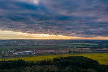 Aerial drone photography of the city suburbs, highway around the main city. 
