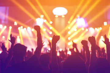 silhouettes of  , Fun concert party rock disco light background.