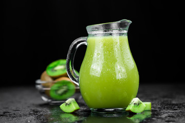 Kiwi Smoothies on a slate slab (selective focus)
