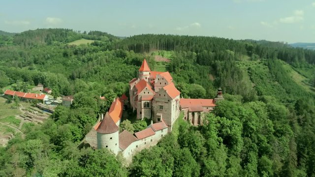 Aerial View of Fabulous Pernstejn Castle (hrad Pernstejn) on a rock in the South Moravian Region, Czech Republic, Europe. 4K Drone Zoom shot