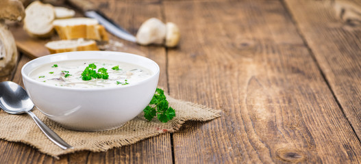 Fresh made Porcini Soup on a rustic background