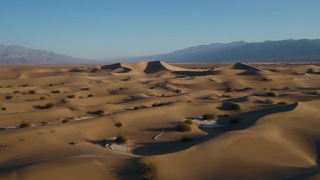 Aerial California Death Valley May 2019 Sunny Day 30mm 4K Inspire 2  Aerial video of Mesquite Flat sand dunes in Death Valley National Park on a beautiful sunny day.