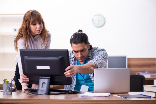 Young male it specialist in the office