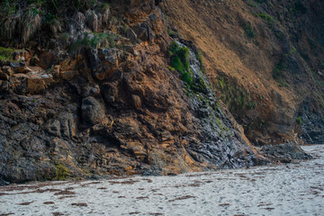 Naklejka na ściany i meble view of cliff on beach